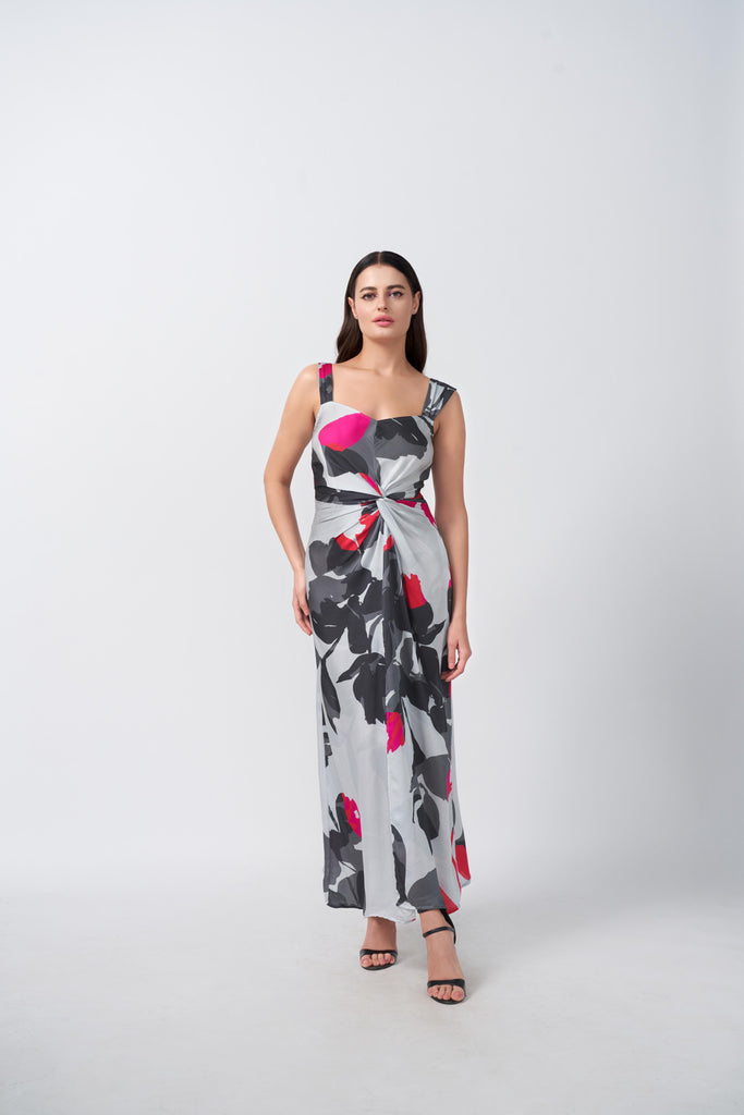 Front-facing view of model in grey and white abstract satin dress with pink-accented front knot.