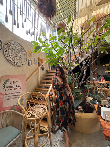 Flowing maxi dress with a halter neckline and a sultry front slit for easy movement