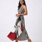 Elegant halter neckline maxi dress with a deep V-front and open-back tie detail