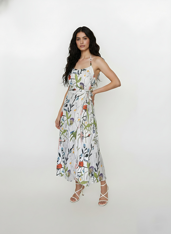 Elegant ankle-length halter neck dress in flowing chinon, ideal for sophisticated daytime events and garden gatherings