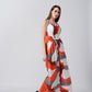 Orange and grey abstract print ankle-length dress with a halter neckline, ideal for casual evening outings and relaxed gatherings