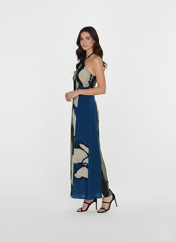Ankle-length crepe dress with a halter tie-back neckline and keyhole detail, featuring a navy blue and beige abstract floral print with olive and cream accents, suitable for refined evening occasions
