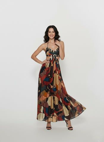 Long halter-neck dress with a bold, artistic pattern in shades of teal, brown, and black, ideal for tropical vacations, resort wear, or summer evening events.