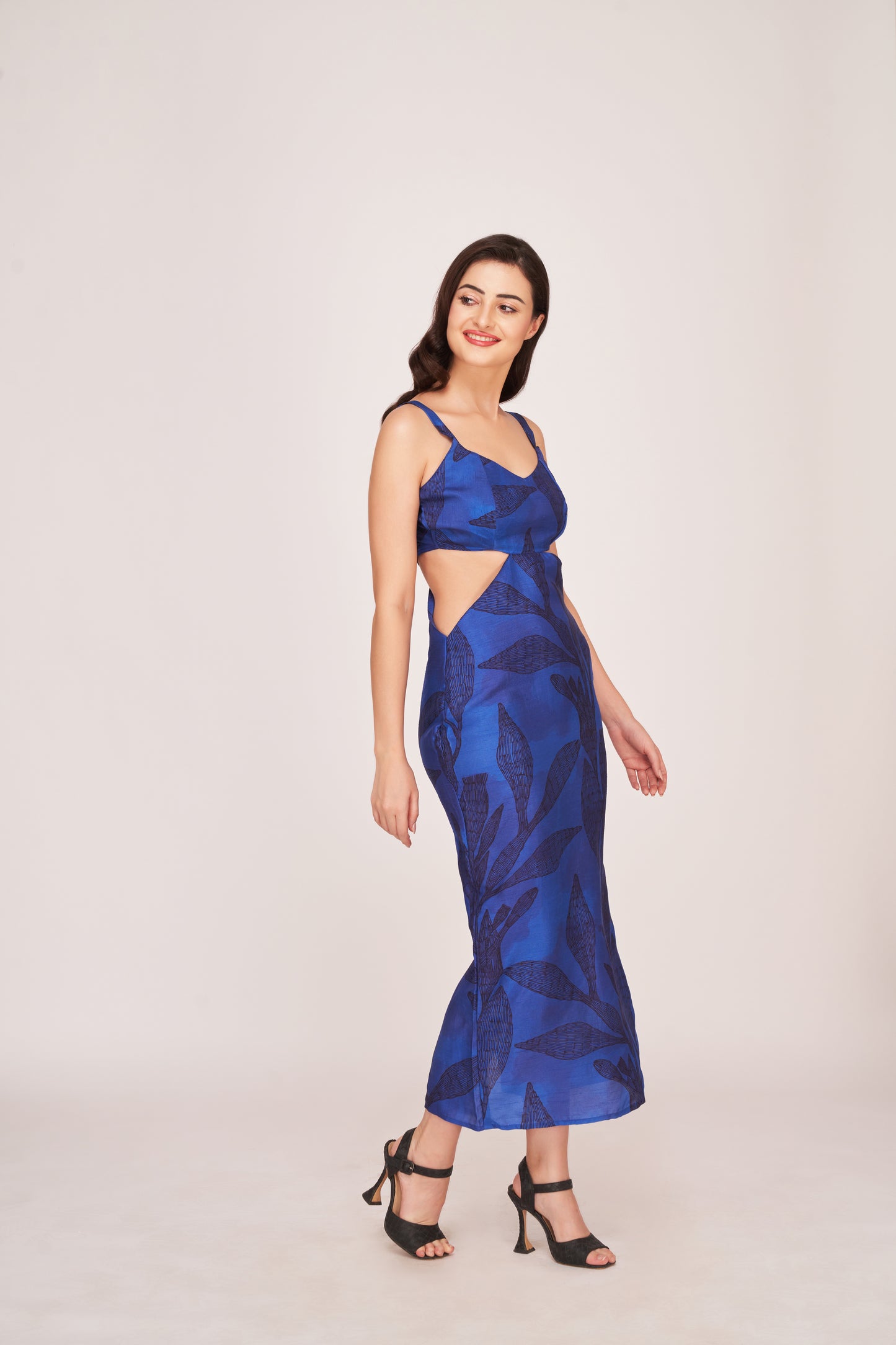 Blue floral silk midi dress with side cut-outs, suitable for parties and romantic date nights