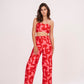 Pink-red geometric print Palazzo pants in lightweight cotton satin. Perfect for summer, mix and match for distinct looks.