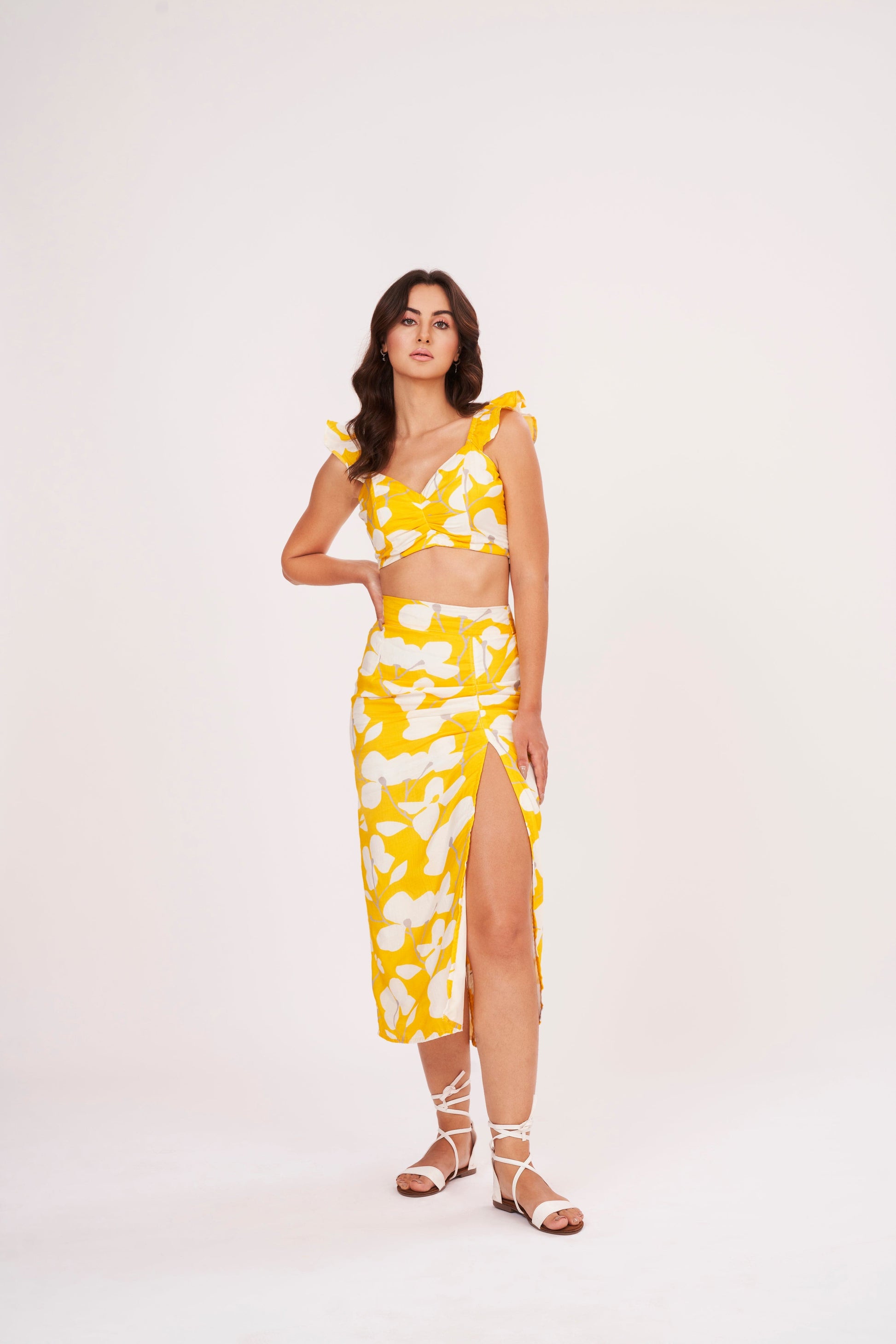Thigh-length floral skirt with lightweight muslin fabric, ensuring comfort in hot weather. Abstract print exudes sophistication, while trendy cut complements modern appeal.
