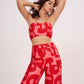Pink-red geometric print Palazzo pants in lightweight cotton satin. Perfect for summer, mix and match for distinct looks.
