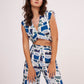 Image of a printed crop top from Designer Co Ord Set made from premium muslin fabric. Trendy v-neck and bold geometric design in vibrant colors.