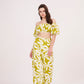 Green geometric print, loose-fit, wide-legged flowy trousers perfect for a breezy, relaxed feel during summer.