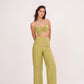 Elegant green halter neck bralette with ruched detailing and tie-up closure, part of a chic co-ord set for confidence and style.