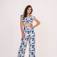 Image of a printed crop top from Designer Co Ord Set made from premium muslin fabric. Trendy v-neck and bold geometric design in vibrant colors.