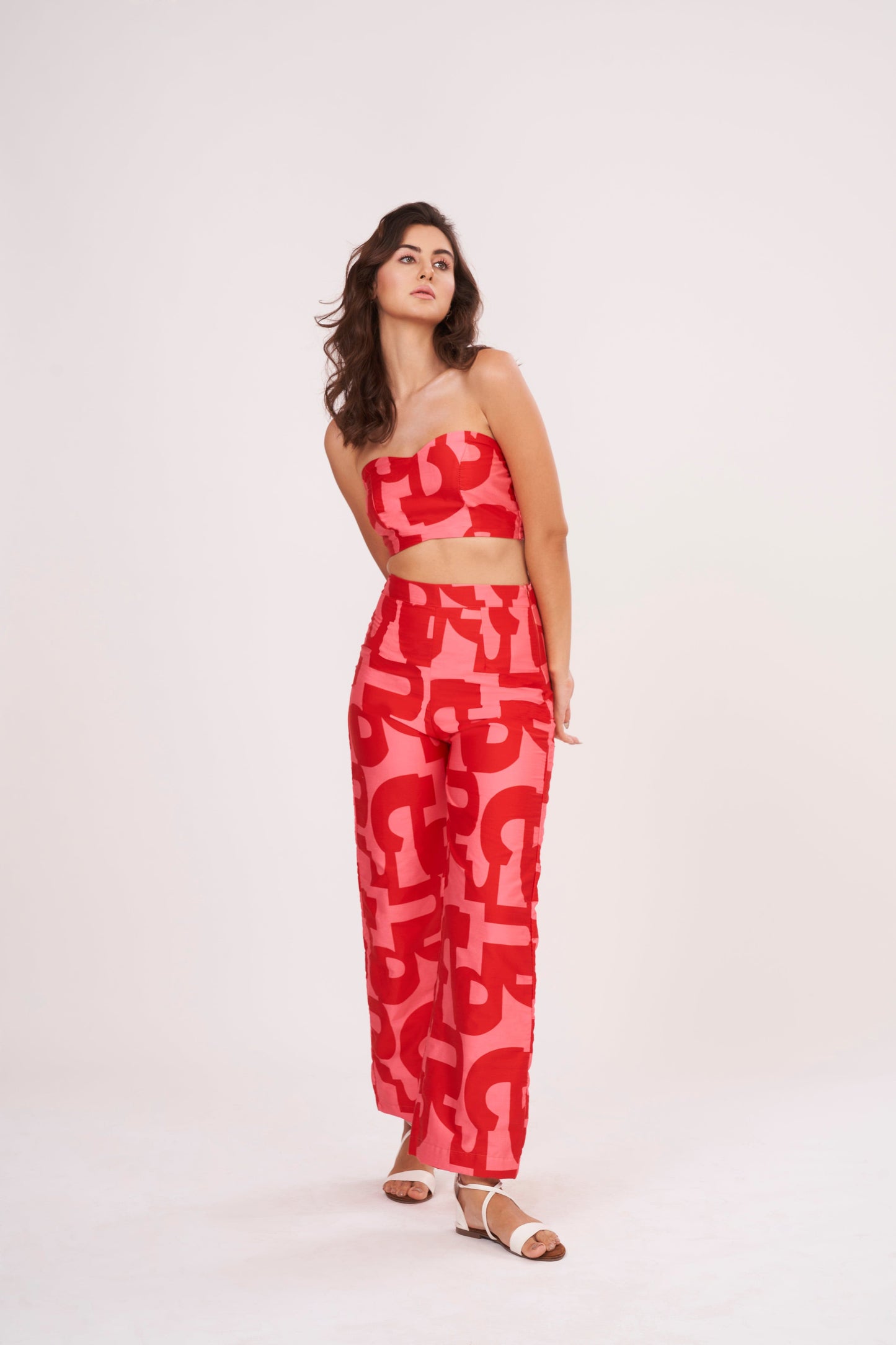 Pink-red geometric print Palazzo pants in lightweight cotton satin. Perfect for summer, mix and match for distinct looks.