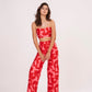 Pink-red geometric print Palazzo pants in lightweight cotton satin. Perfect for summer, mix and match for distinct looks.