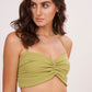 Elegant green halter neck bralette with ruched detailing and tie-up closure, part of a chic co-ord set for confidence and style.