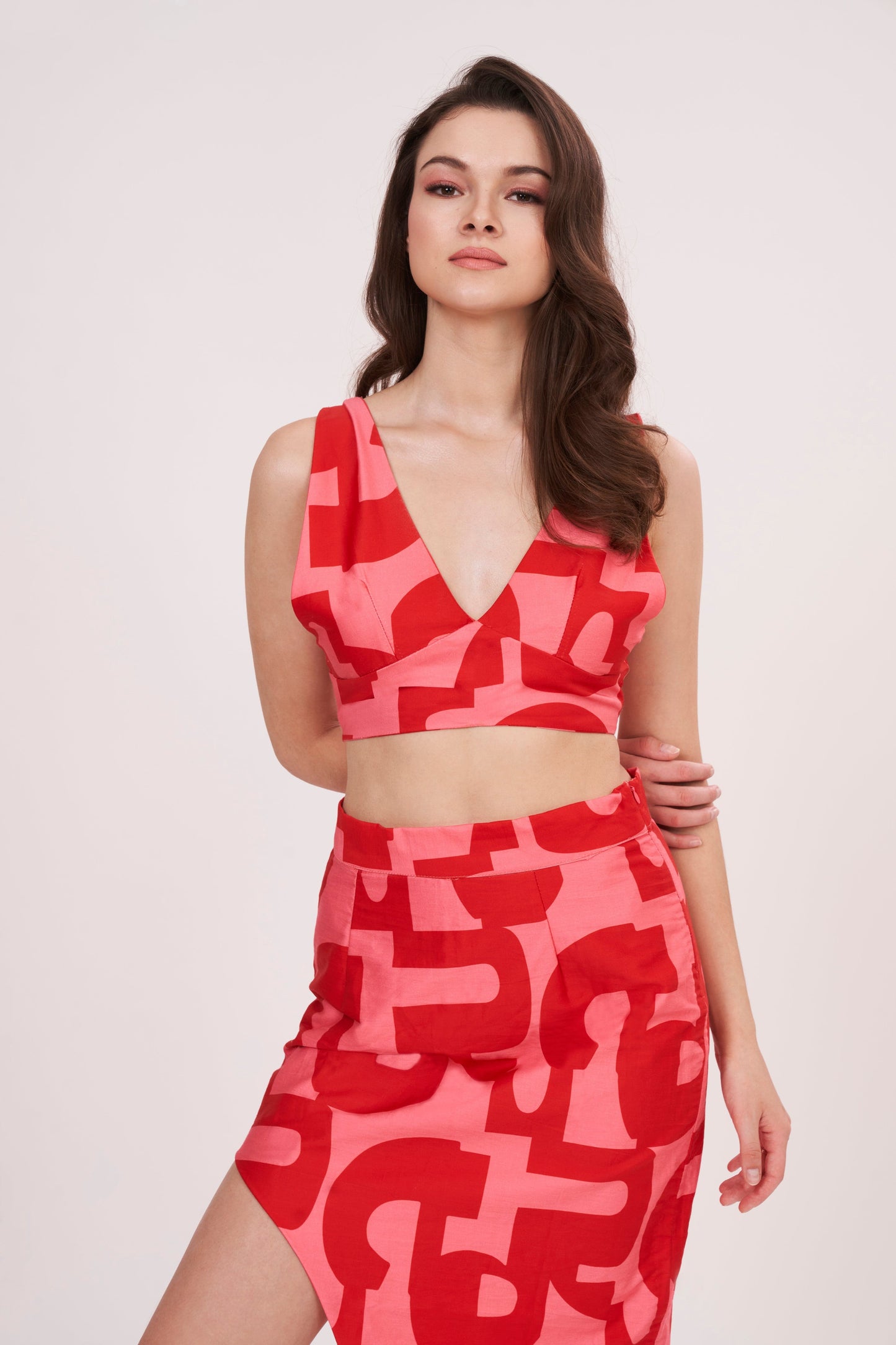 Summer v-neck crop top made from muslin fabric with intricate geometric design. 