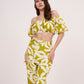 Green geometric print, loose-fit, wide-legged flowy trousers perfect for a breezy, relaxed feel during summer.