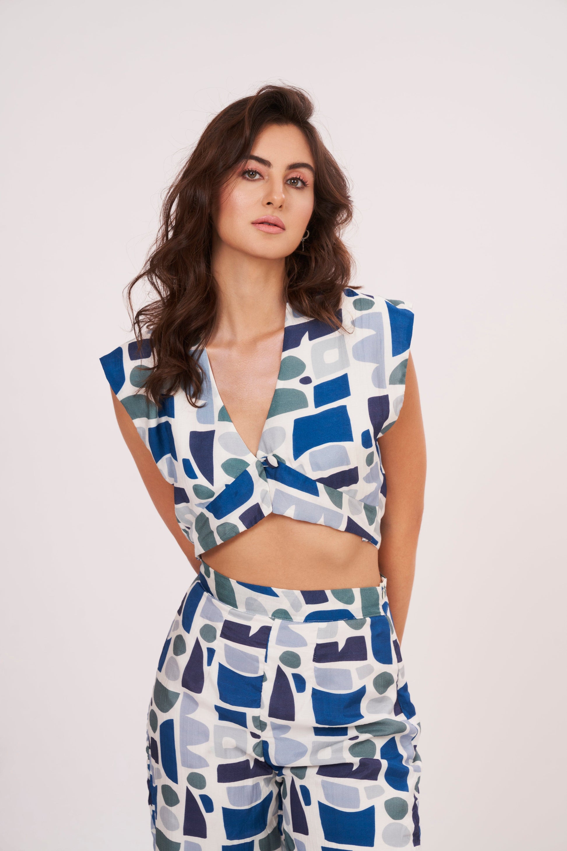 Image of a printed crop top from Designer Co Ord Set made from premium muslin fabric. Trendy v-neck and bold geometric design in vibrant colors.
