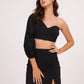 Elegant high-waisted black muslin skirt with thigh-high slit, offering sophistication and glamour for chic occasions