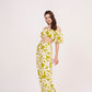 Green geometric print, loose-fit, wide-legged flowy trousers perfect for a breezy, relaxed feel during summer.