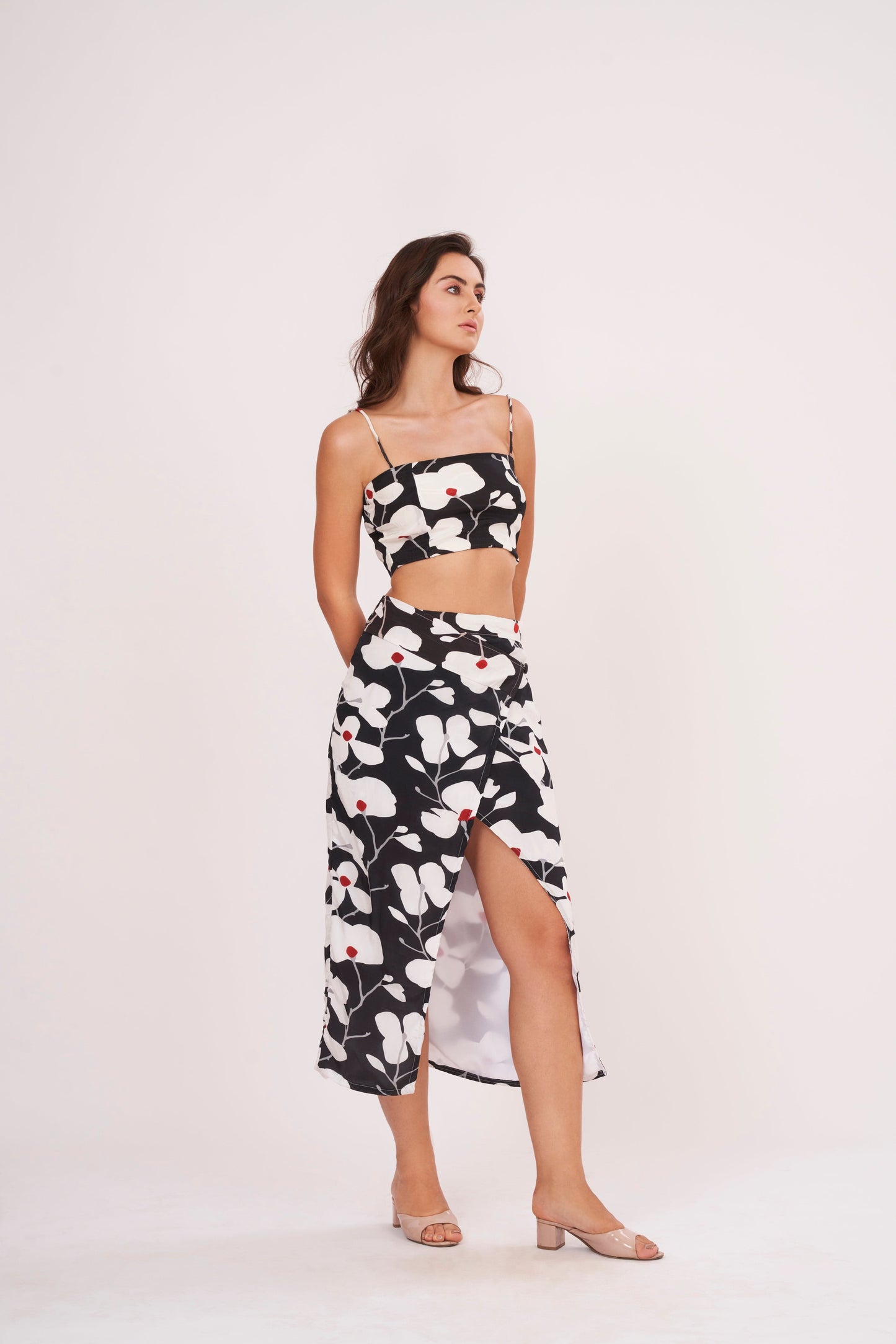 Black floral skirt from Designer Co Ord Set, made of premium crepe, designed to flatter silhouette and elongate legs, perfect for night out or date night.