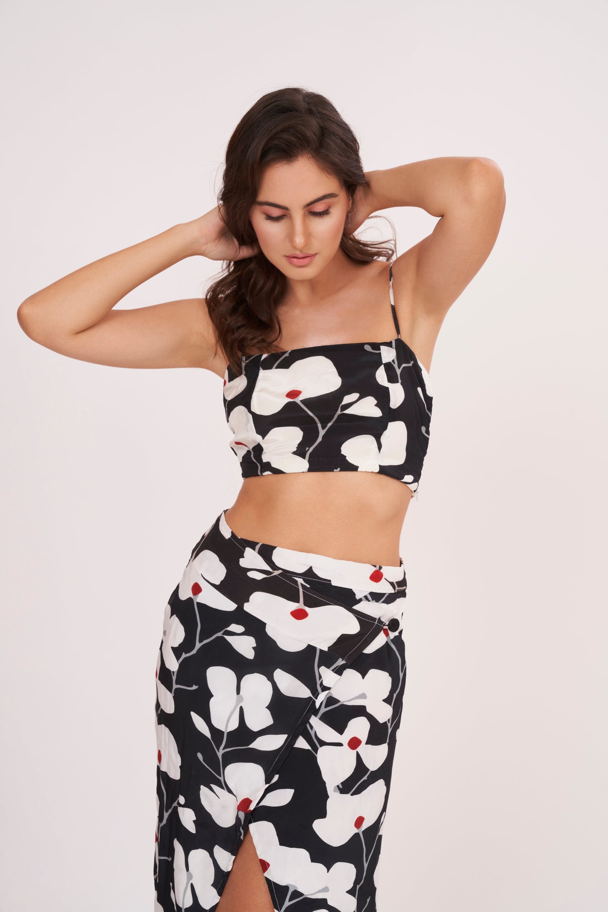Premium quality crepe spaghetti crop top, hugging curves for an edgy, modern look on a night out or casual date.