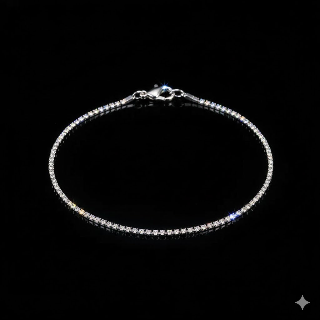 A stunning silver line anklet featuring a continuous row of shimmering crystals, perfect for adding a touch of high-end glamour to a party look.