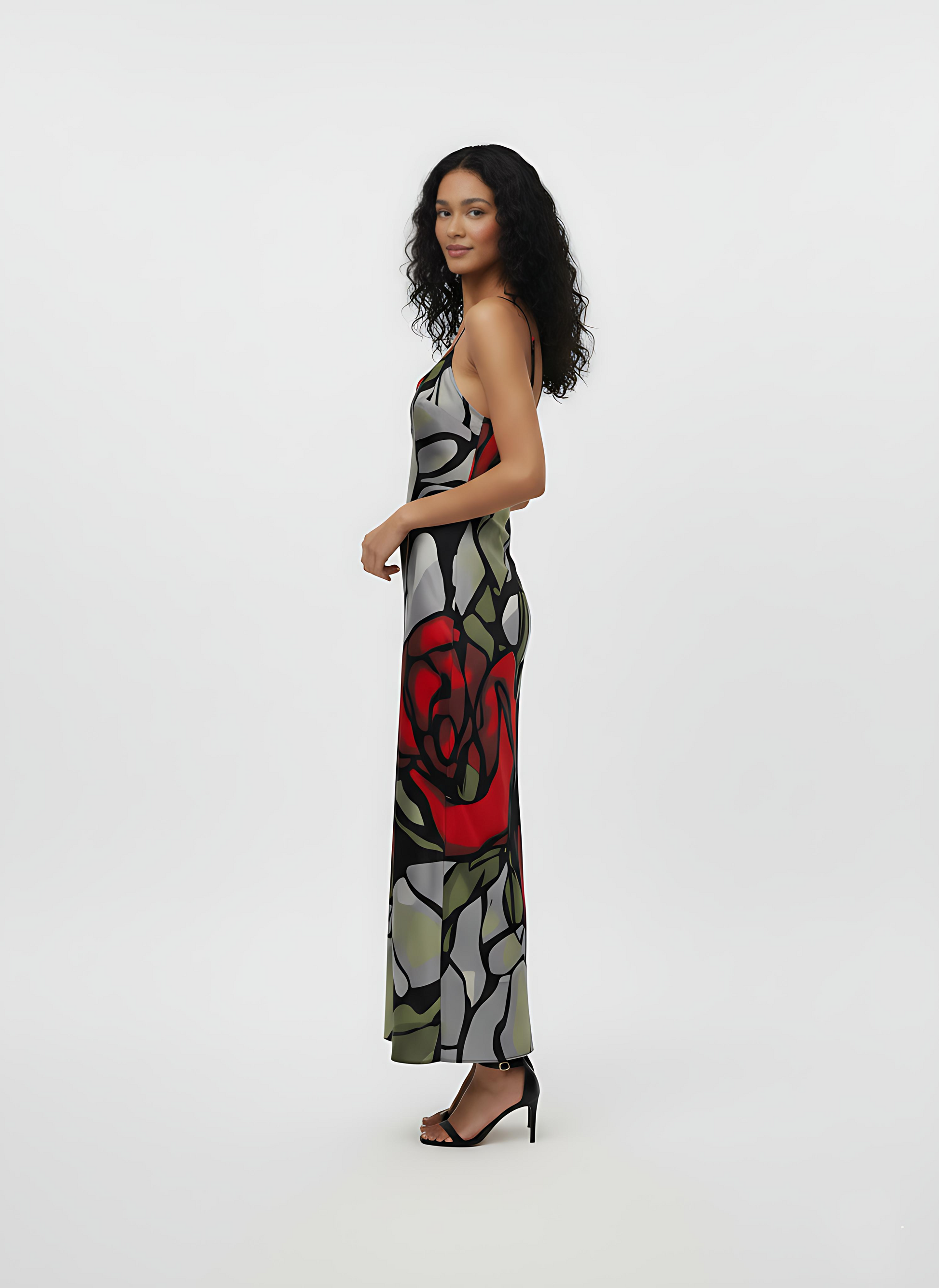 Crepe midi slip dress with a cowl-draped scoop neckline, spaghetti straps, and a bold floral abstract print in scarlet and neutral tones.