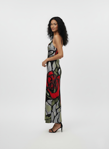 Crepe midi slip dress with a cowl-draped scoop neckline, spaghetti straps, and a bold floral abstract print in scarlet and neutral tones.