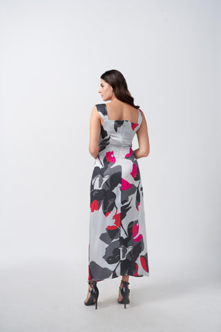 Back view of a grey and white abstract floral satin ankle-length dress with a smooth silhouette