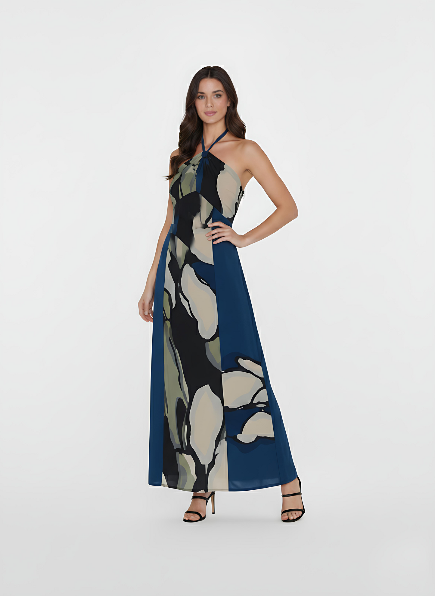 Ankle-length halter-neck dress featuring a sophisticated high neckline that ties at the back. The garment flows into a relaxed, floor-grazing silhouette adorned with an oversized abstract floral print in mossy greens and deep teals, making it a go-to for garden parties or summer events