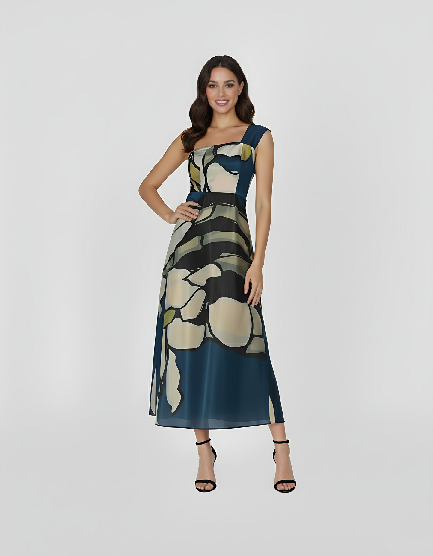 Full-length, one-shoulder dress featuring a striking oversized floral print in shades of midnight blue, sage green, and muted cream. The sleek, asymmetrical one-shoulder neckline creates a modern silhouette.