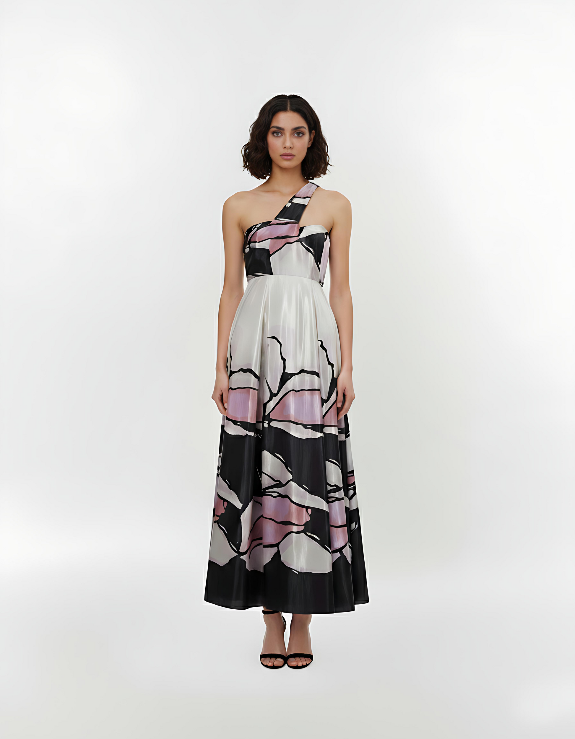 One-shoulder crepe maxi dress with a fitted waistband and flowy A-line silhouette, featuring an abstract floral-inspired print for elegant evening occasions.