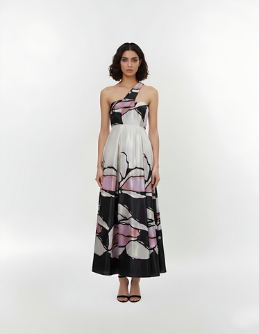 One-shoulder crepe maxi dress with a fitted waistband and flowy A-line silhouette, featuring an abstract floral-inspired print for elegant evening occasions.