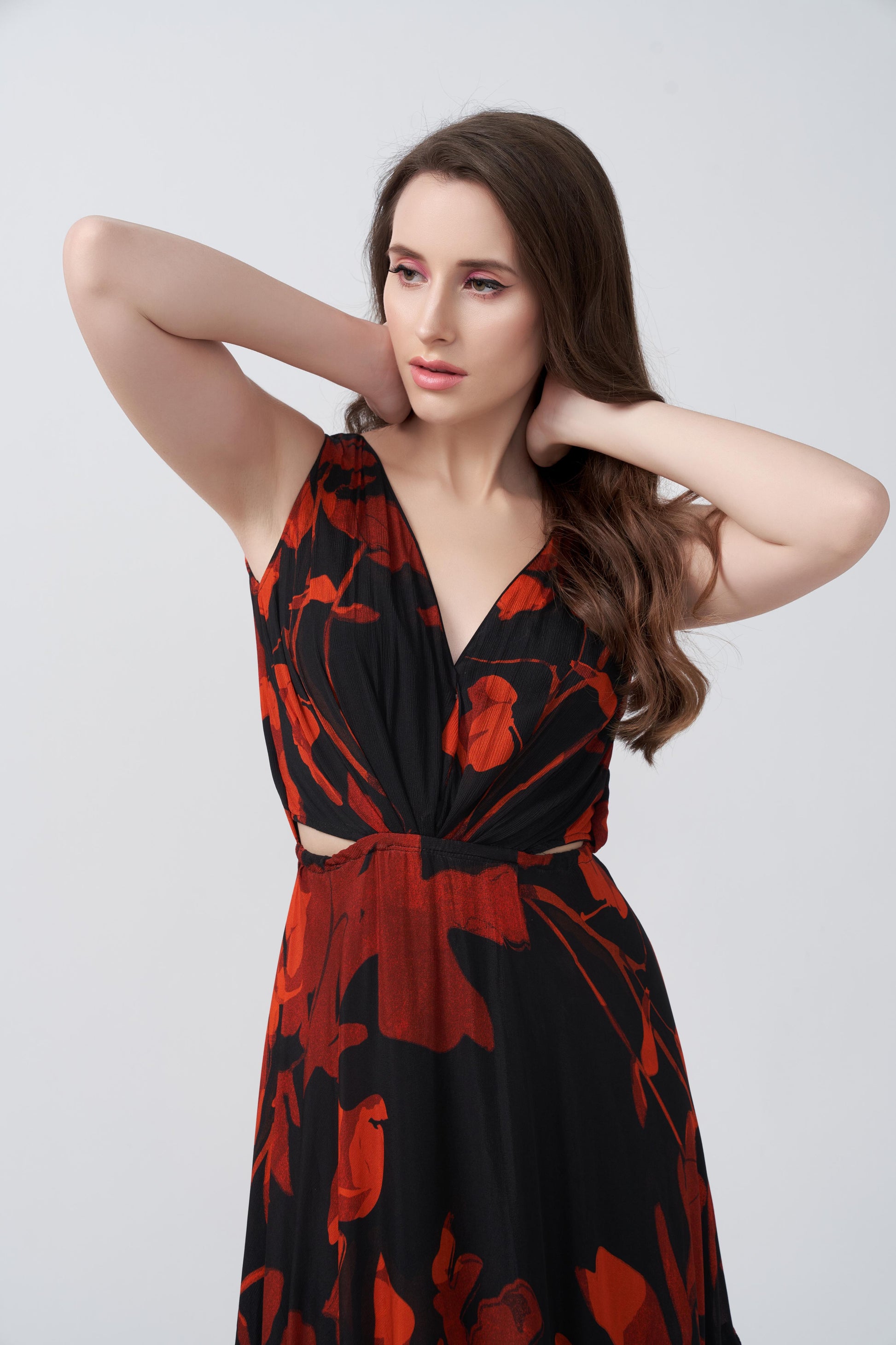 Close-up view highlighting the V-neckline and gathered bodice of the floral dress.