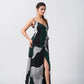 Contemporary abstract print showcasing bold organic shapes in deep forest green, charcoal black, and cool grey tones.