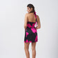Rear view of halter tie-back satin dress showcasing the open back and strap detail.