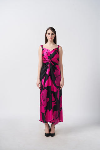 Pink and black floral satin ankle-length dress with a front slit, suitable for sophisticated events and formal gatherings