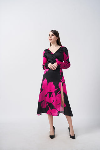 Pink and black floral silk midi dress with a side slit, suitable for upscale events and formal gatherings