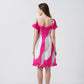 Back view of pink and white printed chinon dress showing short hemline and lightweight flow.