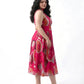 Pink A-line midi dress in lightweight chinon with pleated waist detailing, ideal for effortless vacation styling