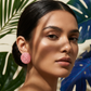 A beautiful blend of bohemian and modern styles, these hot pink woven earrings feature an organic, handcrafted texture designed to elevate a neutral linen outfit or a colorful sundress.