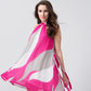 Candid mid-motion shot of model in pink and white chiffon dress with hands out, emphasizing its breezy silhouette.