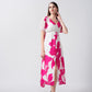 V-neck pink and white floral midi dress with puff sleeves, suitable for garden parties and upscale brunches