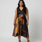 Plus size black modal satin midi dress with a deep V-neckline and asymmetric hemline