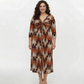 Plus size ikat print chinon midi dress with a deep V-neckline, ruched waist, and front slit