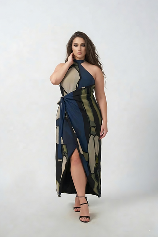 Plus size navy blue and beige floral crepe wrap dress with a halter tie-back and asymmetric silhouette