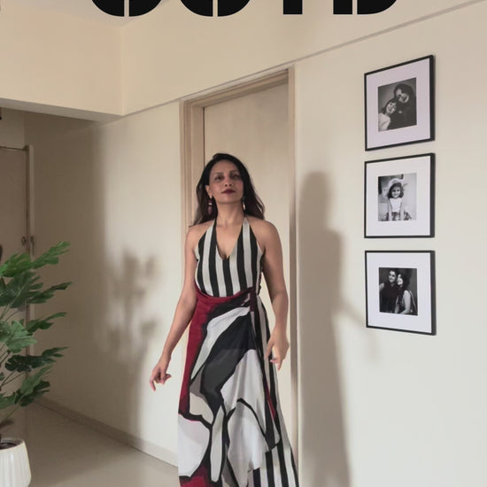 Plus-size striped maxi dress styled for cocktail evenings and festive celebrations
