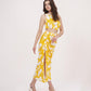 Yellow printed muslin co-ord set with a one-shoulder top, suitable for summer brunches and daytime outings