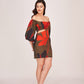 Model stands cross legged in off-shoulder floral satin mini dress with puffed sleeves and a confident expression.