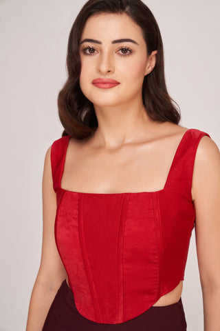 Two-piece crepe set with a structured corset top and coordinating trousers